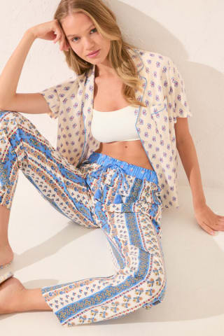 Pantalón largo con estampado allover de cenefa Women'secret por 5.99€