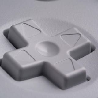 Mando 8BitDo 64 Bluetooth Blanco por 27€ en PcComponentes