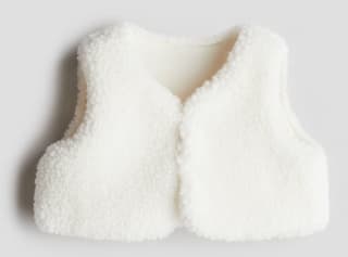Teddy bodywarmer voor baby's voor €2,99 bij H&M
