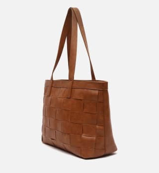 Bolso Shopper trenzado por 18€.