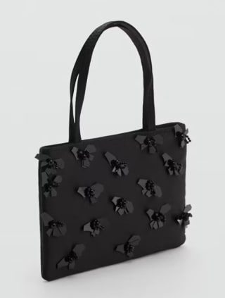 Bolso mano aplique flores por 9.99€