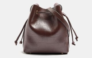 Parfois Bolso Bombonera con grabado animal por 9.99€.