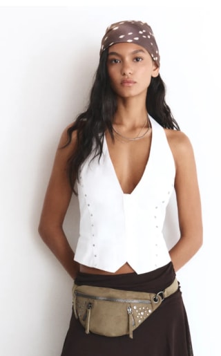 Riñonera con tachuelas por 5.99€