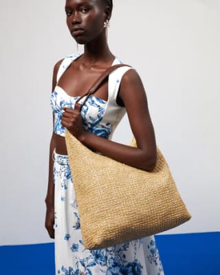 Bolso hobo grande efecto en rafia ed. por 14€