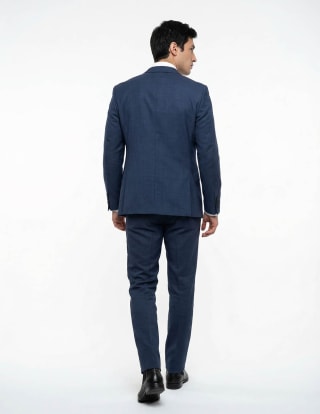 Calvin Klein traje para hombre por $3,514.50 en Liverpool