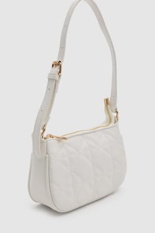 Inside Bolso beige por 11,99€.