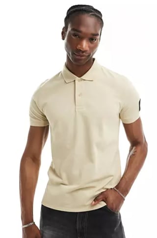 Calvin Klein Jeans Polo beis por 21.60€
