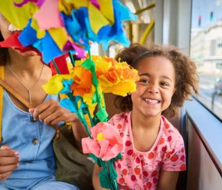 Kids <12 jaar reizen gratis met de kusttram met een standbloem