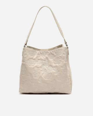 Bolso hubo grande grabado floral por 15€.