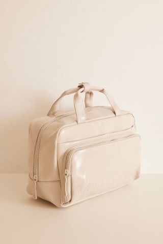 Neceser maletín charol marfil por 11.99€