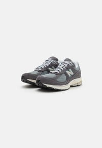 New Balance Sneakers '2002' vanaf €63,96 dmv de code bij Zalando