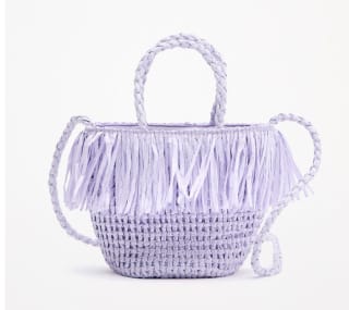 Capazo infantil con flecos efecto rafia color malva o natural por tan sólo 2,99€