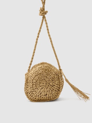 Bolso redondo de yute por 8,99€