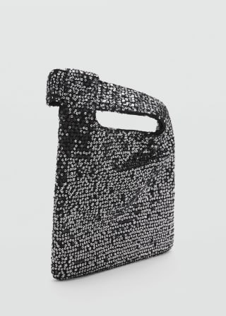 Bolso de mano con lentejuelas por 20,99€.