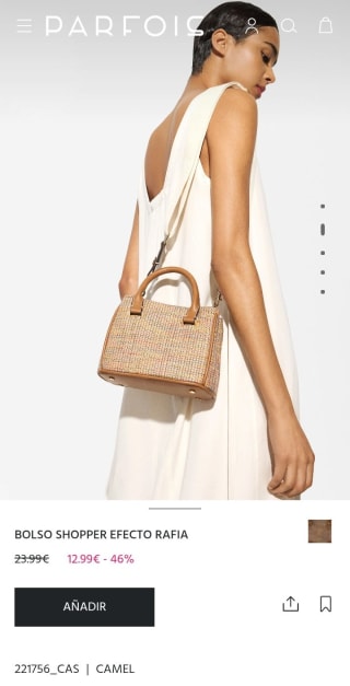 Bolso Shopper efecto rafia por 12,99€.