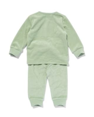 Groene velours baby pyjama voor €4,50 bij De Hema