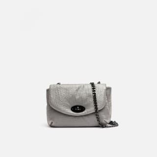 Space Bolso de fiesta con correa metálica por 7,20€.