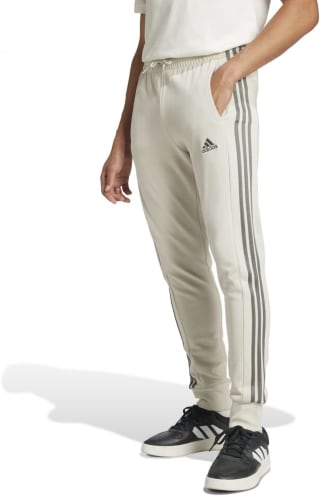 Adidas Essentials French Terry Tapered Cuff 3 Stripes joggingbroek voor €27,50 bij Amazon