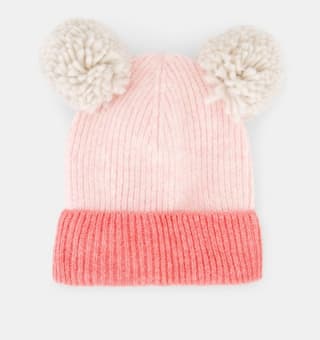 Baby El Corte Inglés Gorro liso bicolor con pompones para bebé por 3.89€.