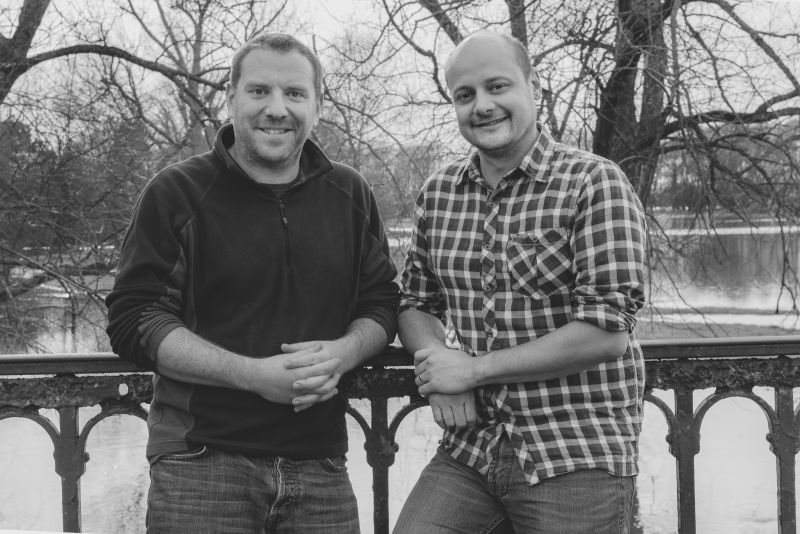 Patrick Morgan and David Kidger standing on a bridge