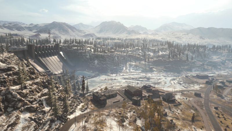 The northern reaches of the Verdansk map in Callof Duty Wazone, showing the dam, frozen lake and various buildings