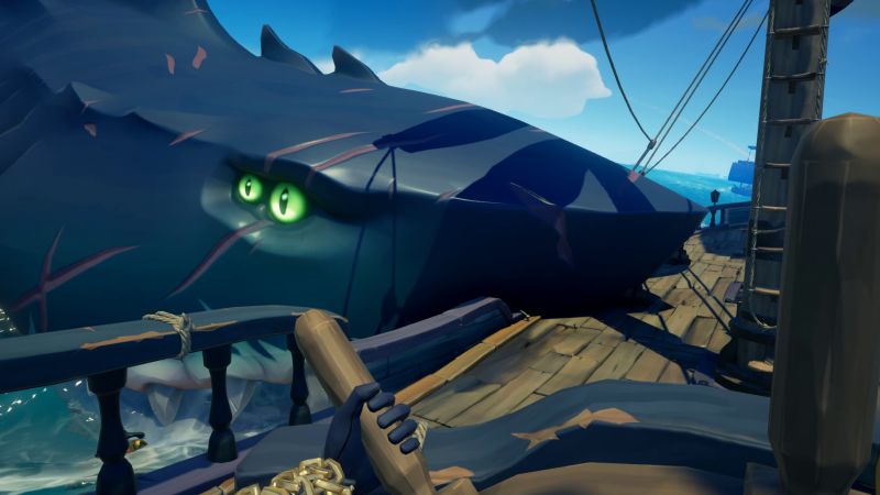 A megalodon attacking a player ship in Sea of Thieves