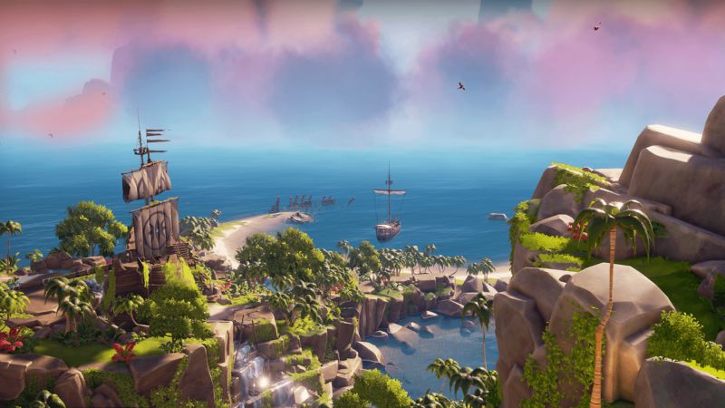 Sea of Thieves: A rocky island in the sun showing a ship moored in a cove