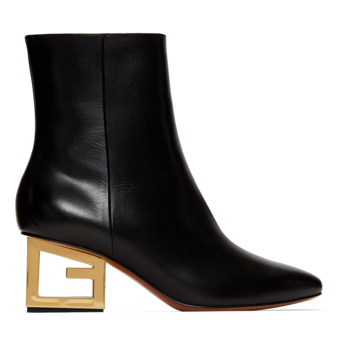 Click to view more detailed imagery on our partner's website Givenchy Leather Pointed Ankle Booties With Logo Golden Heel In 001 Black