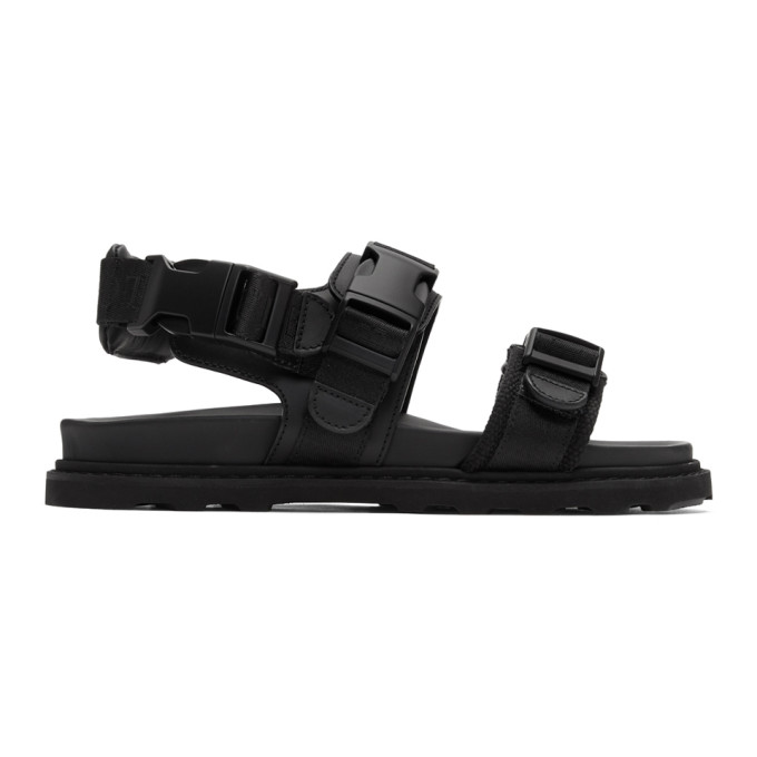 Click to view more detailed imagery on our partner's website Bottega Veneta Webbing-Trimmed Leather And Wool Sandals In 1000-Black
