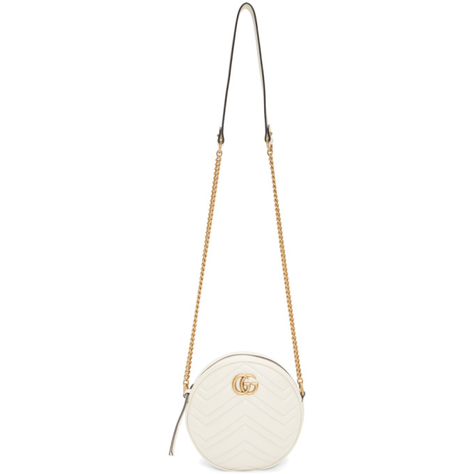 white circle gucci purse