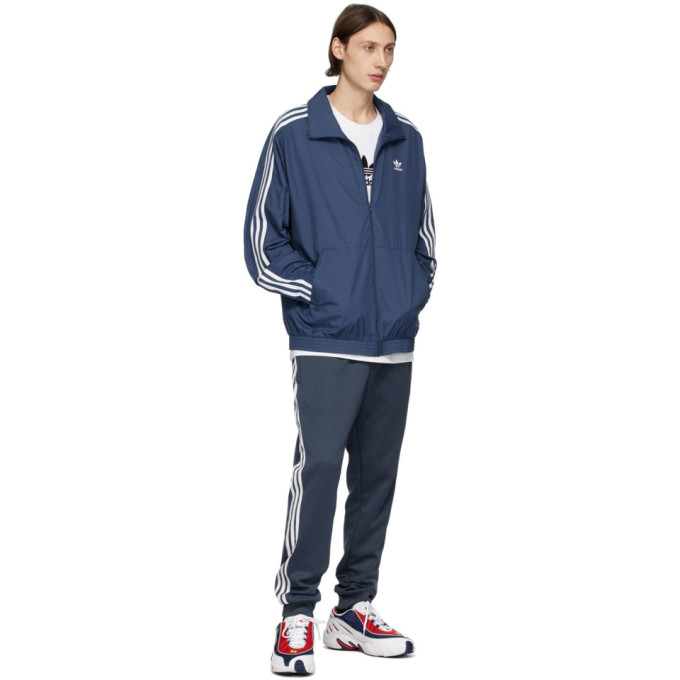 ADIDAS ORIGINALS ADIDAS ORIGINALS WHITE AND NAVY FYW 98 SNEAKERS