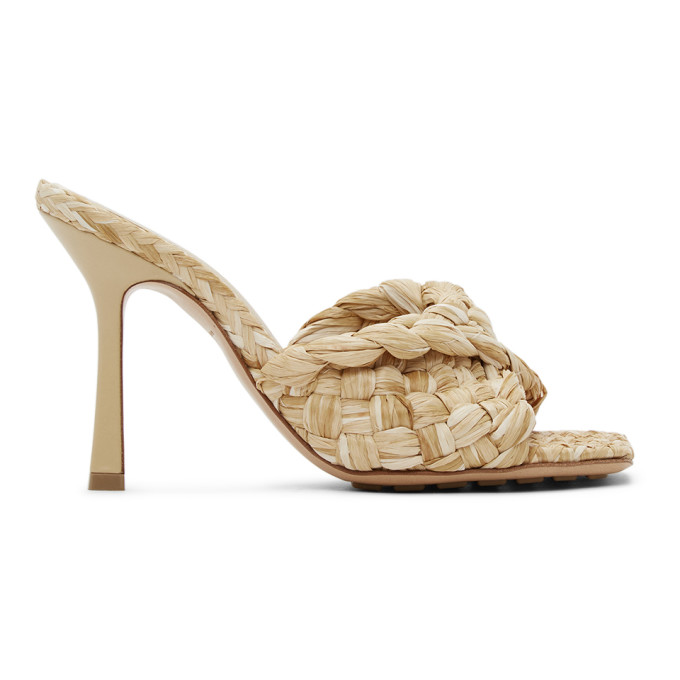 Click to view more detailed imagery on our partner's website Bottega Veneta Macadamia Intrecciato Raffia Stretch Mule Sandals In 2627 Macadamia