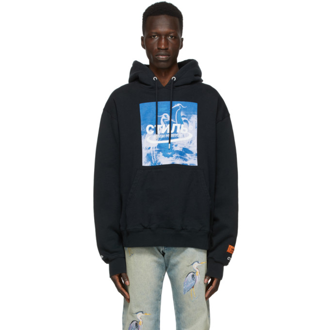 Click to view more detailed imagery on our partner's website Heron Preston Herons Halo Hooded Cotton Sweatshirt In Black Blue