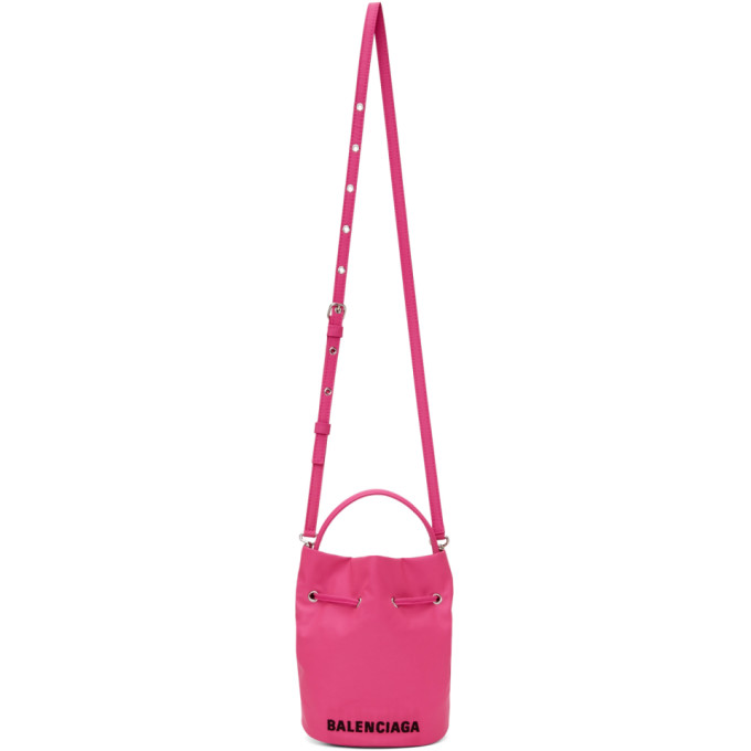 Click to view more detailed imagery on our partner's website Balenciaga Xs Drawstring Wheel Bucket Bag Fluorescent Pink