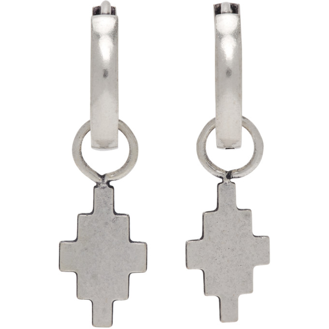Click to view more detailed imagery on our partner's website Marcelo Burlon County Of Milan Hoop Earrings With Cross Pendant In Silver