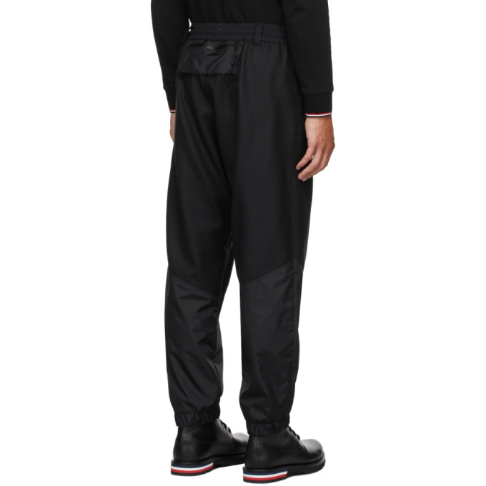 Shop Moncler Black Wool Paneled Pants In 999 Black