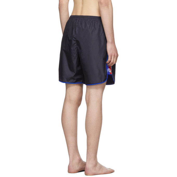 Shop Gucci Navy Logo Stripe Swim Shorts In 4487 Blue