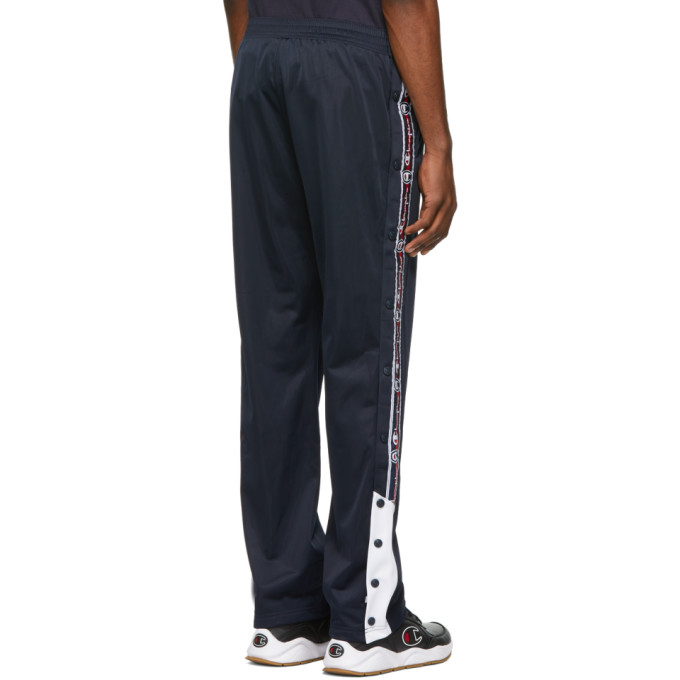 champion reverse weave popper taped track pant