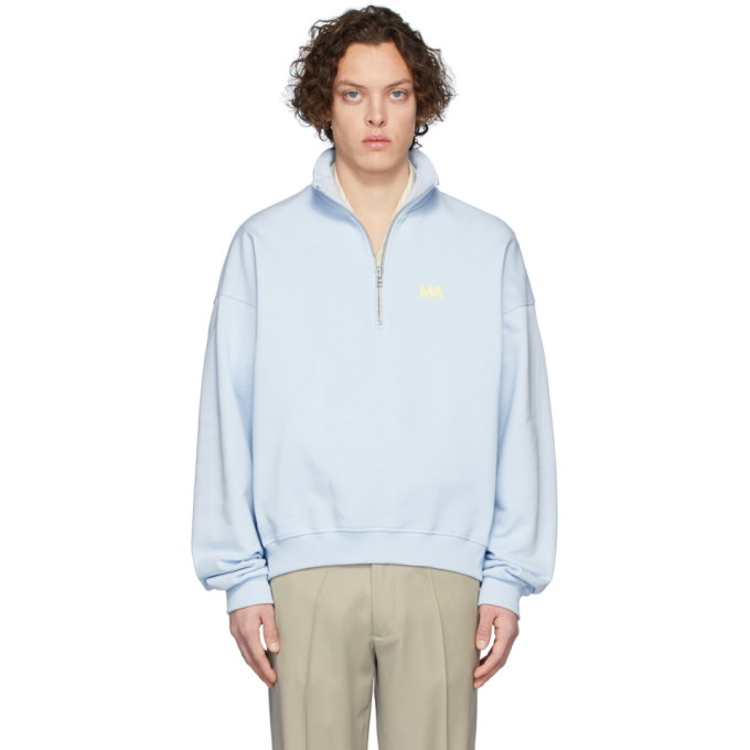 blue zip up sweater