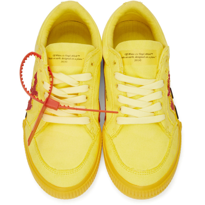 off white black red blue and yellow shoes