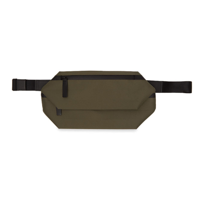 Click to view more detailed imagery on our partner's website Issey Miyake Men Khaki Galette Belt Bag In 65 Khaki