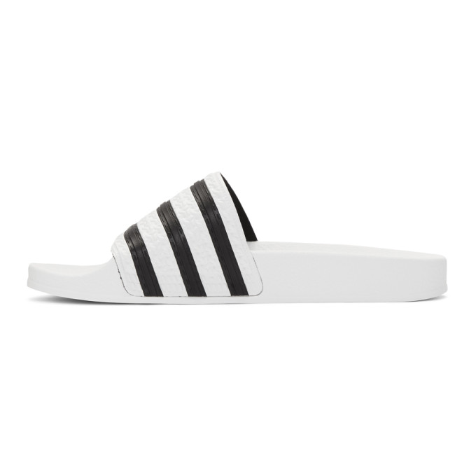 ADIDAS ORIGINALS ADIDAS ORIGINALS WHITE AND BLACK ADILETTE SLIDES