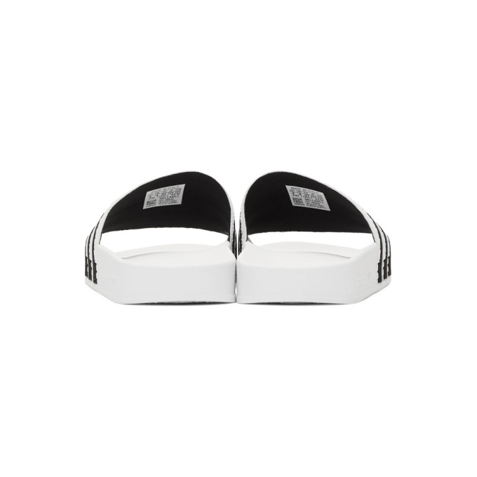 ADIDAS ORIGINALS ADIDAS ORIGINALS WHITE AND BLACK ADILETTE SLIDES