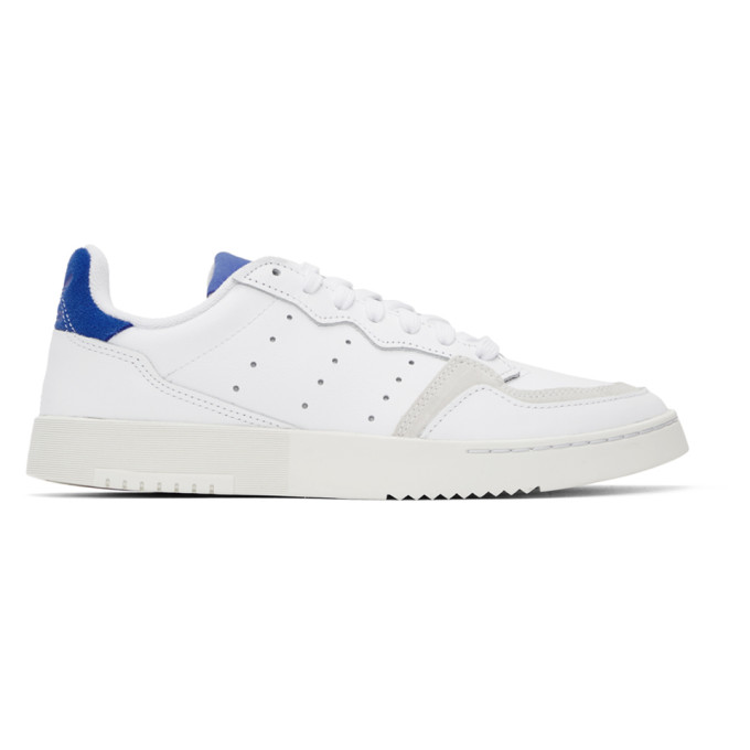 ADIDAS ORIGINALS ADIDAS ORIGINALS WHITE AND BLUE SUPERCOURT SNEAKERS