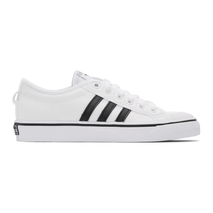 adidas originals nizza canvas trainers in white and blue