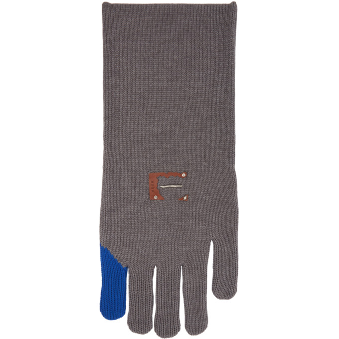 Click to view more detailed imagery on our partner's website Ader Error Grey Torn Label Finger Muffler Scarf