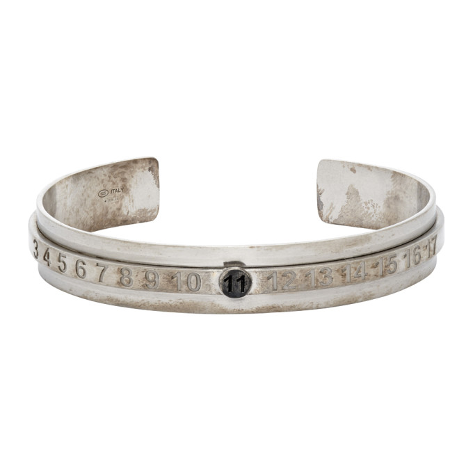 Click to view more detailed imagery on our partner's website Maison Margiela Silver Buratto Bangle Bracelet In 969 Silver