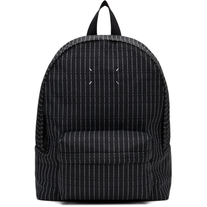 Click to view more detailed imagery on our partner's website Maison Margiela Canvas Backpack With Logo Embroidery In T8013 Black