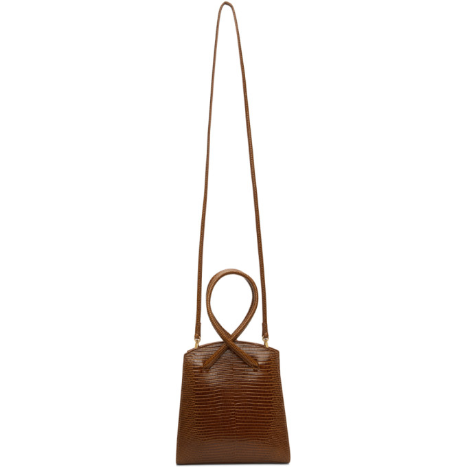 Click to view more detailed imagery on our partner's website Little Liffner Twisted Wristlet Bag In Nougat