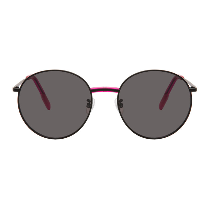 Click to view more detailed imagery on our partner's website Kenzo Black Shiny Round Sunglasses In Pldm Green